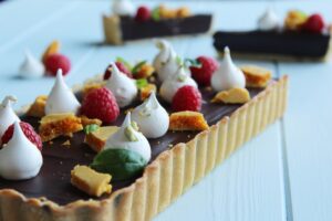 Dark Chocolate Tart with Honeycomb and Pistachio Meringues by Chef Shane Smith