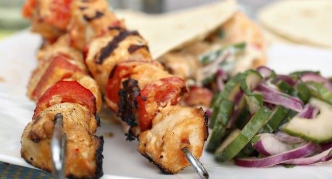 chicken satay sticks with cucumber salad