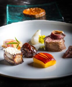 manresa-all-of-the-lamb-nectarine-espelette-credit-eric-wolfinger
