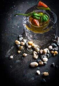 manresa-padrons-and-figs-with-pepper-consomme-credit-eric-wolfinger