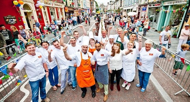 Clonakilty's brigade of chefs prepare to serve over 1500 meals to visitors to Clonakilty's Street Carnival. The carnival celebrates the reopening of the main street after 18 months of work to install a new flood relief system and a new streetscape, at a cost of €2.3 million. Photo by Dermot Sullivan.