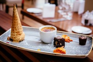 Chocolate Tasting Plate – Chocolate & Orange Brownie, Chocolate Marquis, White Chocolate Crème Brulee, Honeycomb. Ice House Hotel