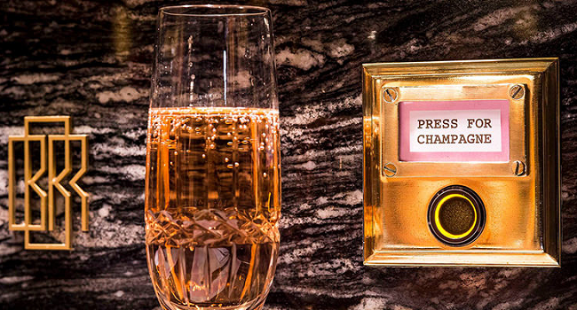 The Ultimate Work Perk Luxury Office to Have Press for Champagne Desk Buttons