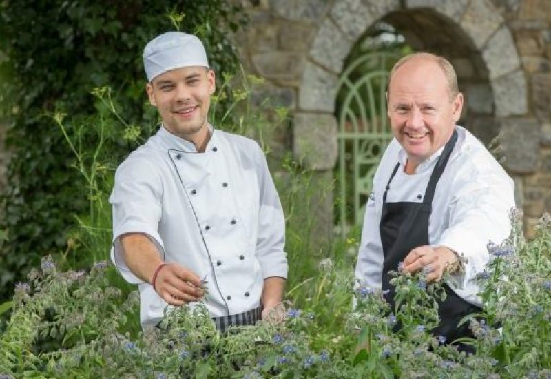 CLIFF ACADEMY - Recruit Reinis Vidins with tutor Martin Potts in the kitchen gardens
