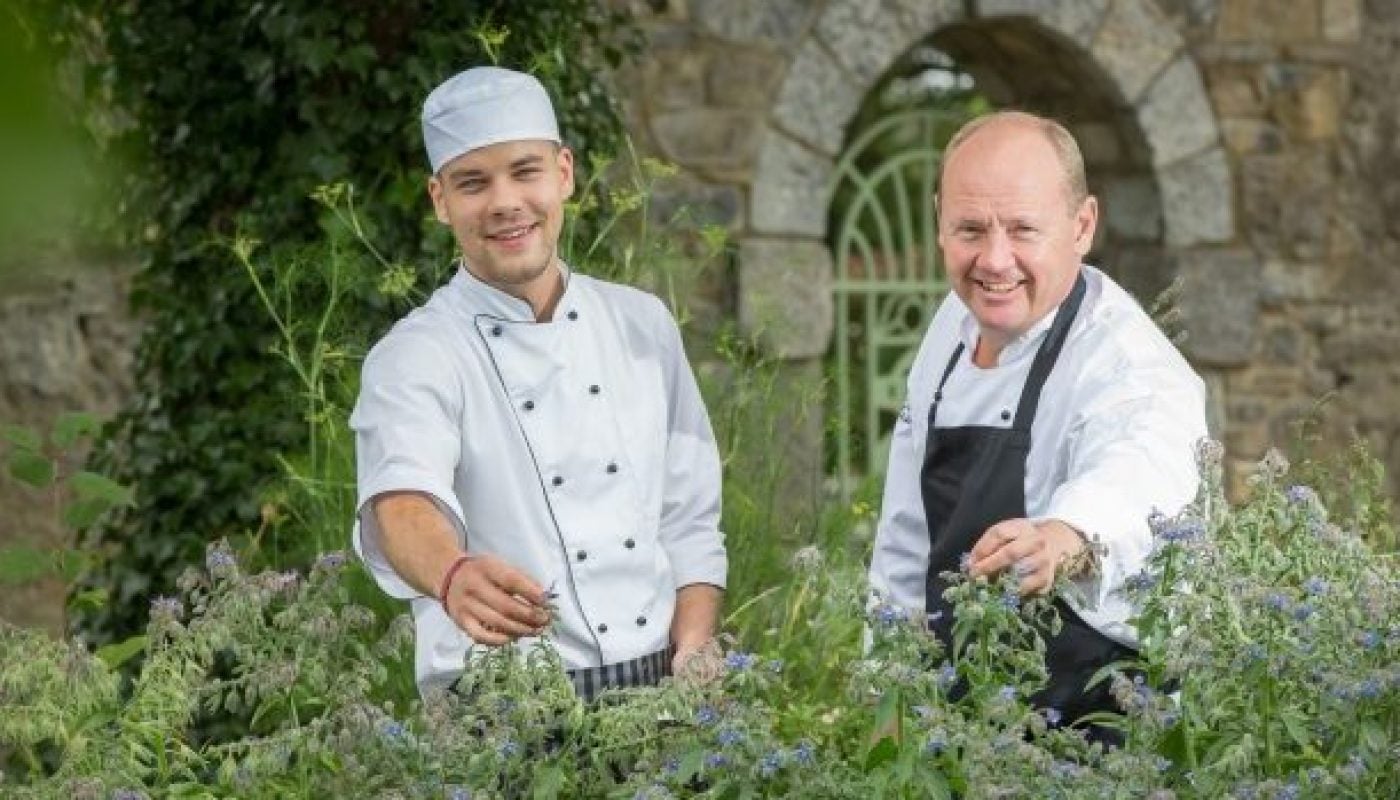 CLIFF ACADEMY - Recruit Reinis Vidins with tutor Martin Potts in the kitchen gardens