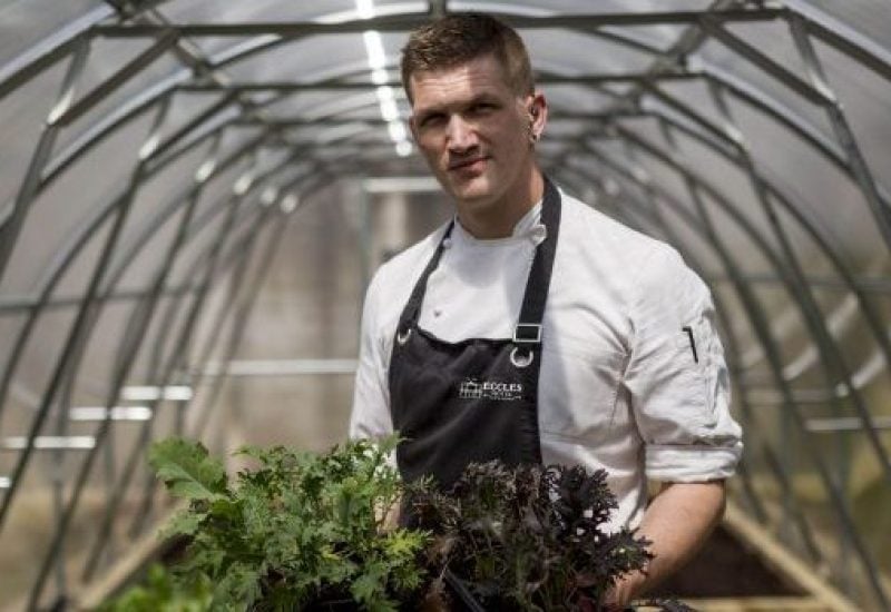 Chef Eddie Atwell in polytunnel
