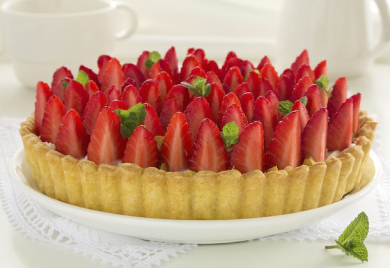 Strawberry tart with mascarpone and pistachios.