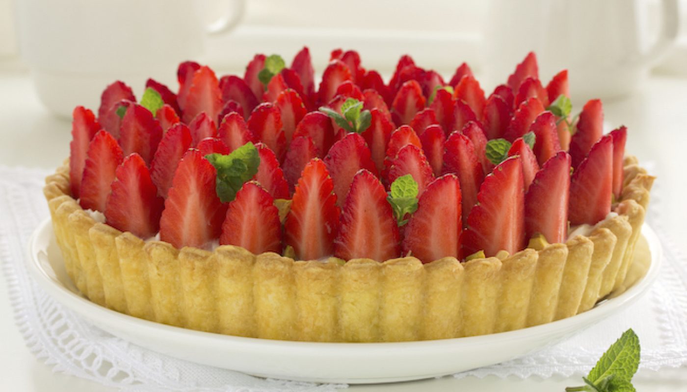 Strawberry tart with mascarpone and pistachios.