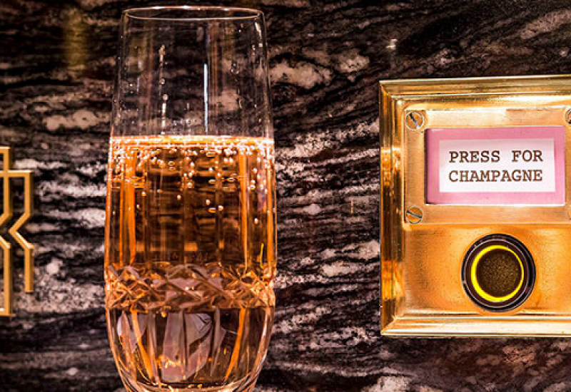 The Ultimate Work Perk Luxury Office to Have Press for Champagne Desk Buttons