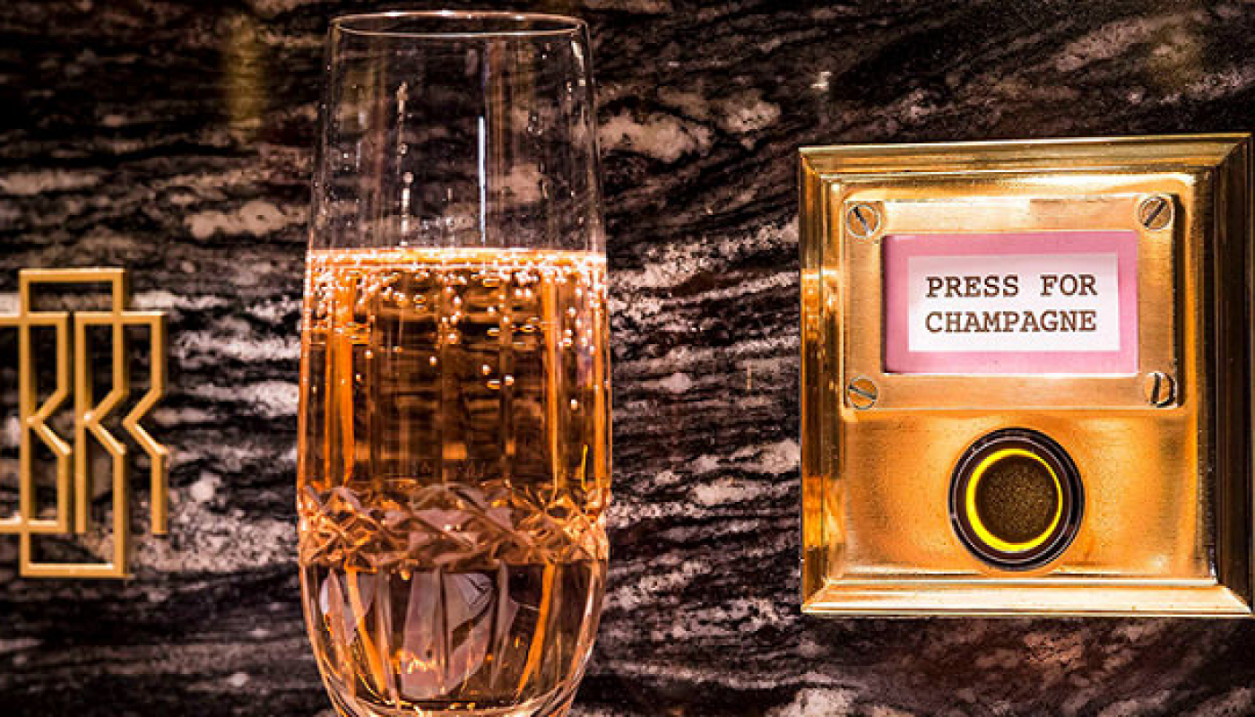 The Ultimate Work Perk Luxury Office to Have Press for Champagne Desk Buttons