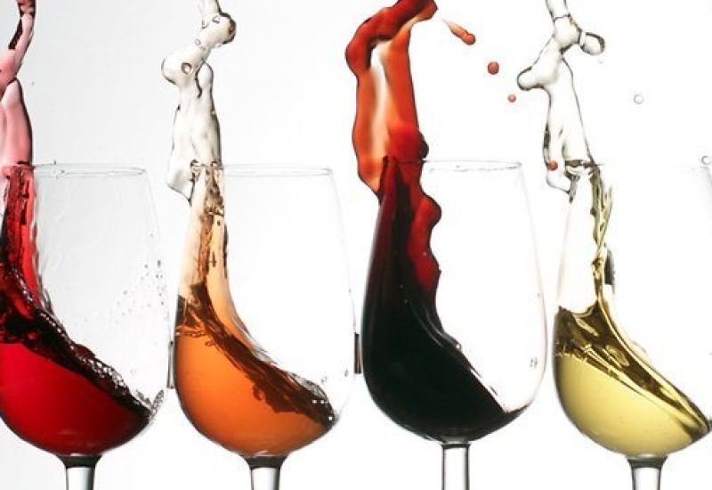 Wine Splashing out of Glass