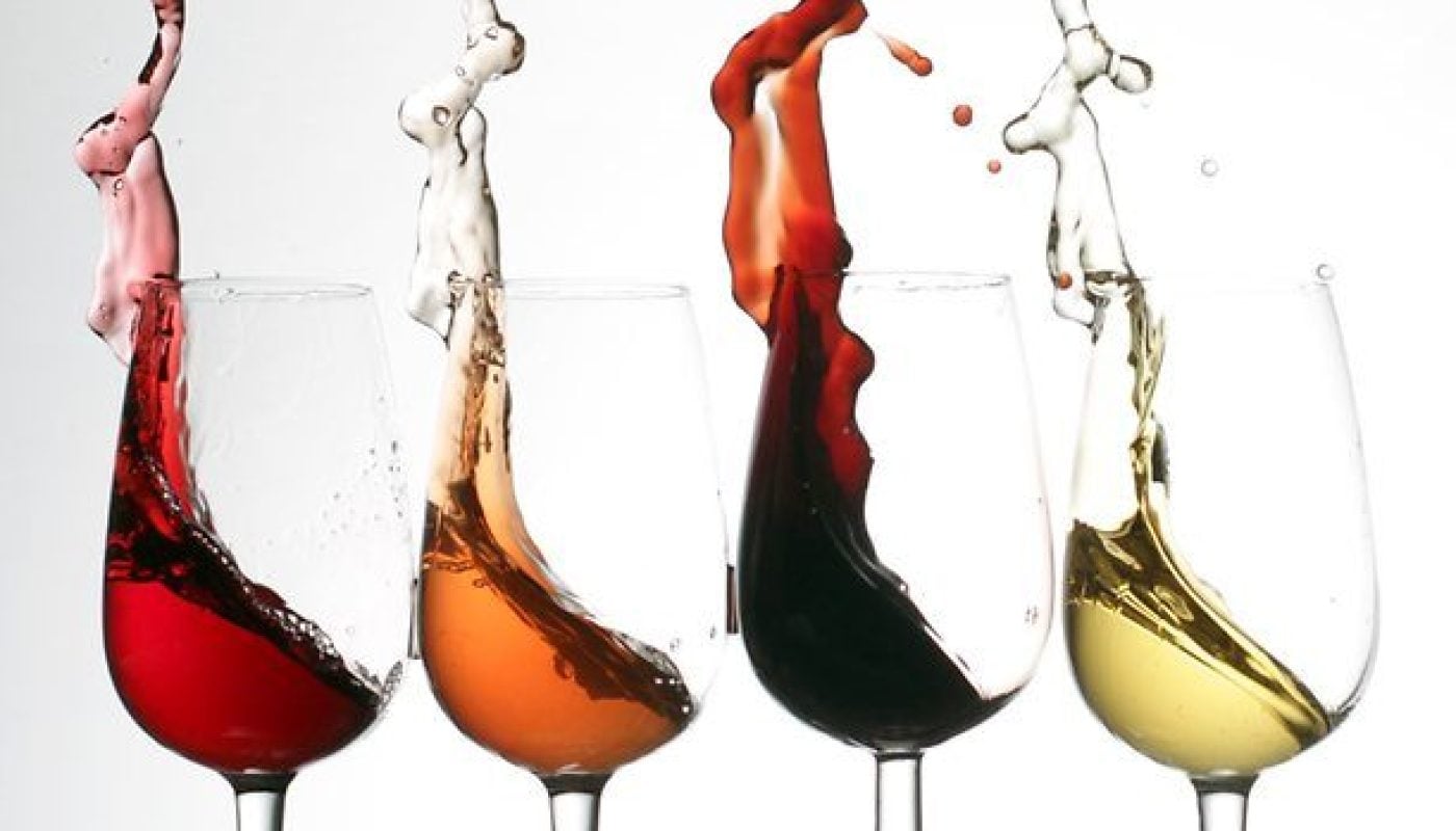 Wine Splashing out of Glass