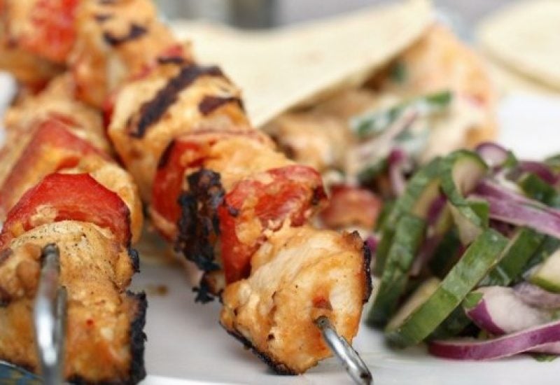 chicken satay sticks with cucumber salad