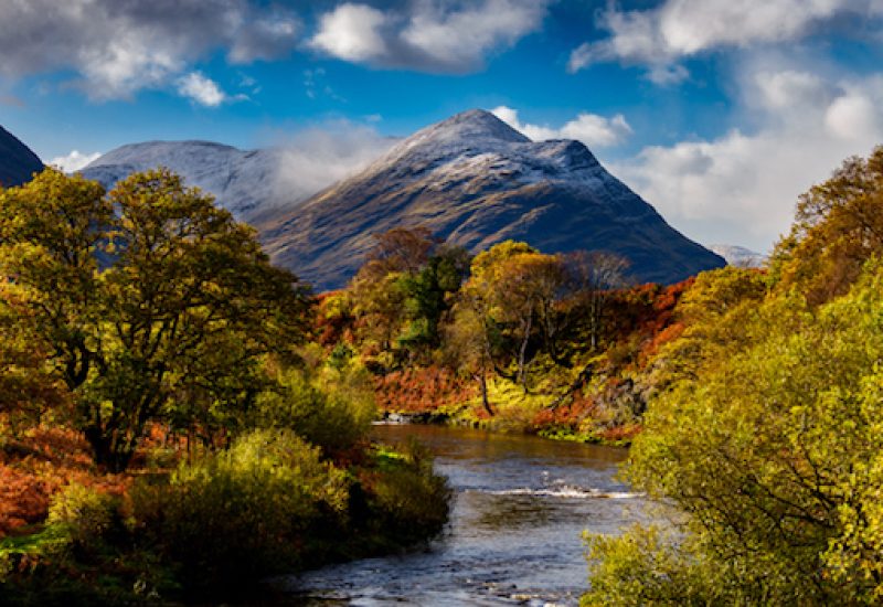 Cloudy sky, river and mountains in Connemara