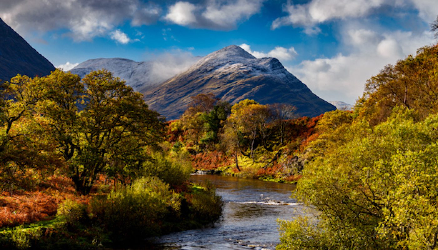 Cloudy sky, river and mountains in Connemara