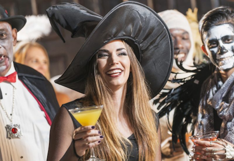 Adult halloween party, witch drinking