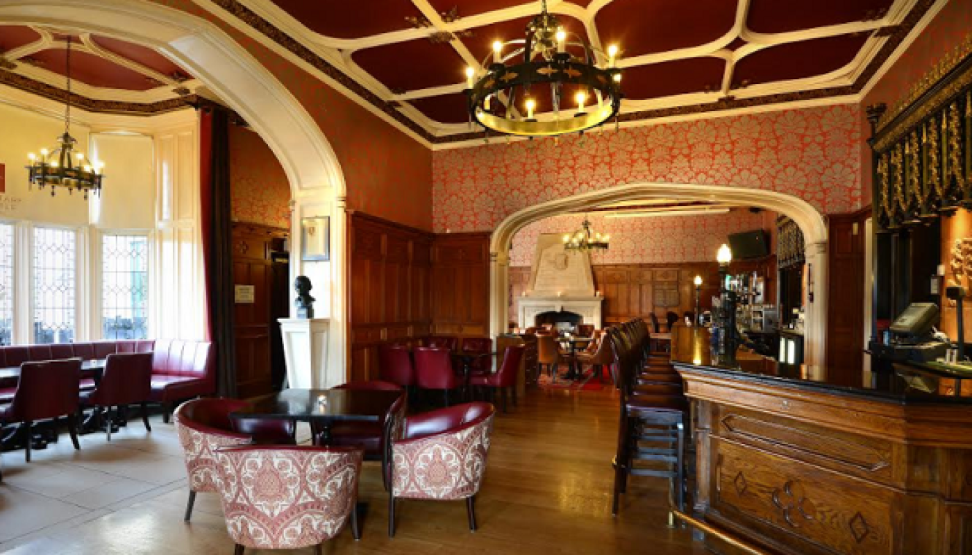 One of Dublin's most inviting bars, the Knights Bar at Clontarf Castle, has teamed up with local favourite The Five Lamps Brewery to create their very own pale ale, fittingly named Cluain Tarbh, Clontarf's original name in Irish. The time honoured Knights Bar at Clontarf Castle Hotel is the perfect setting to enjoy this refreshing yet flavourful craft brew, made to effortlessly match the wide array of high-end gastropub dishes from their eclectic menu. Some of the delightful options you can pair your pint of Cluain Tarbh with include the Knights Bar's signature Crispy Pork Belly, served with baked apple puree, Clonakilty black pudding potato cakes and savoy cabbage; Braised Irish Beef Short Ribs (with tagliatelle pasta bound in crème fraiche, truffle, pickled mushrooms, shallots and aged Parmesan ), or Roasted Monkfish and Panko Fried Black Tiger Prawns (with chickpea stew, spiced coconut voluté, roaring bay mussel); all of which have been recently added to the venues' selection of hearty and appetising dishes. The Five Lamps Brewery is an independent craft brewery located in the heart of The Liberties, which focuses on producing high quality beers and is always keen to highlight Dublin's rich brewing heritage and tradition. They've collaborated with the team at the Kings Bar to craft a balanced ale with a creamy top and a refreshing character. Cluain Tarbh Pale Ale is available exclusively at Clontarf Castle Hotel and it's ideal whether enjoyed with friends by the cosy fireplace at the stunning bar, or alongside any of the mouth-watering dishes created by Head Chef is Stuart Heeney, another proud Dubliner who has worked for Michelin starred establishments and prestigious venues across Dublin, and who has cooked at Clontarf Castle since 2012. Fancy visiting the gorgeous Clontarf Castle Hotel? Check out our current offers: Savour a 3 Course Dinner for Two with a Bottle of Wine in Double AA Restaurant Fahrenheit at Clontarf Castle €60 Experience Clontarf Castle with an Overnight Stay for Two in a Deluxe Room with Breakfast and Dinner at Fahrenheit Restaurant for only €185 Experience Sparkling Afternoon Tea with a difference for Two People with Fusion Tea at Clontarf Castle Hotel for €57 More information: clontarfcastle.ie