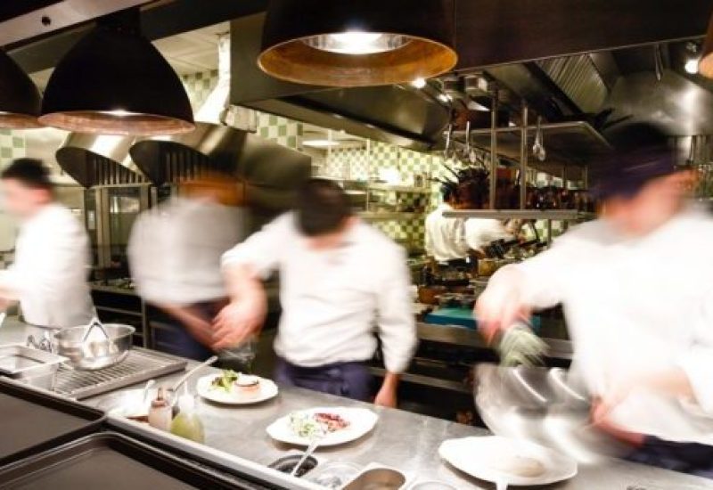 overly-busy-restaurant-kitchen-picture-id641825792
