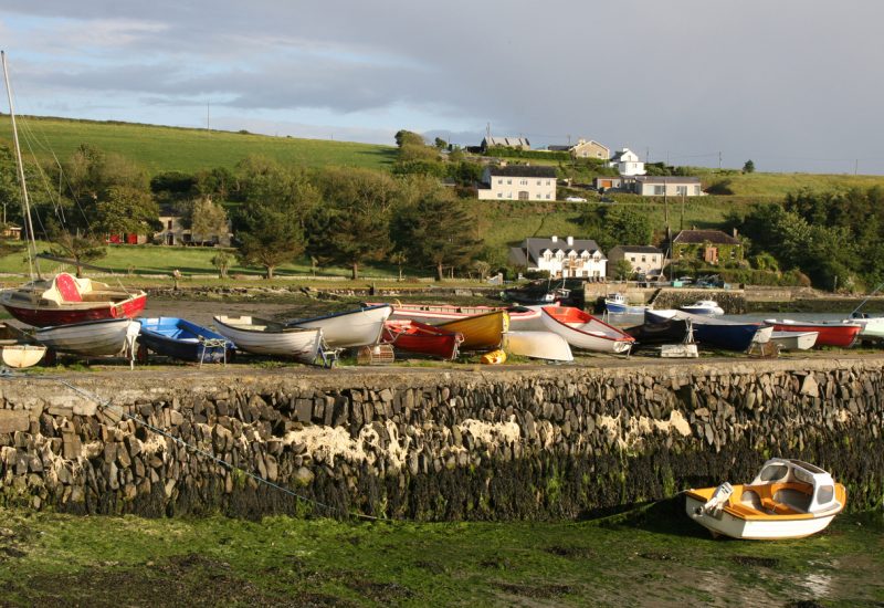 Small boats on  pier Ring, Near Clonakilty South West Ireland